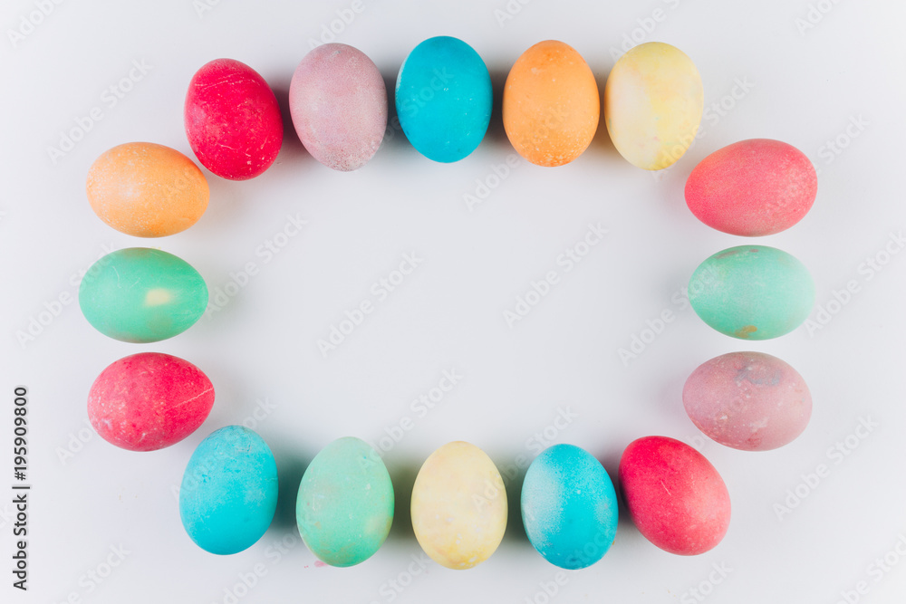 Preparation for Easter. Сolored eggs on a blue background, flat lay and top view. Preparation for Easter. Сolored eggs on a blue background, flat lay and top view.