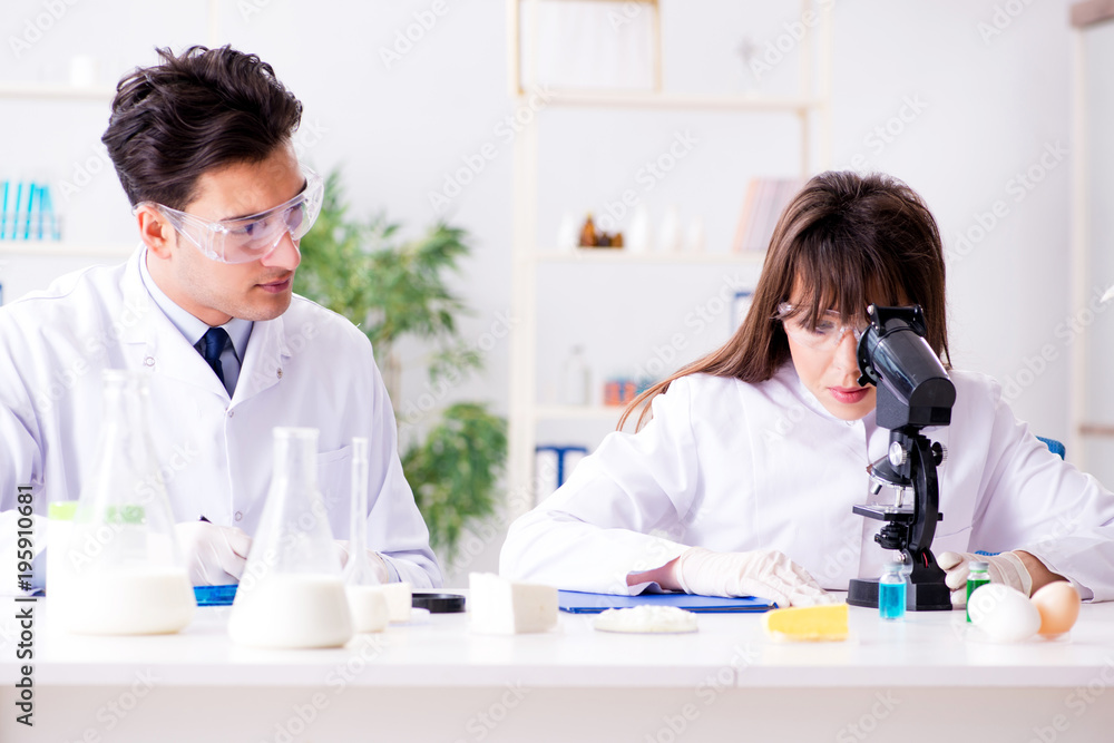 Two lab doctor testing food products Two lab doctor testing food products