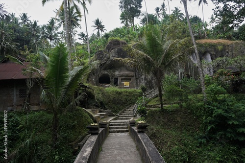 Bridge through the jungle in a stone temple Bali Indonesia