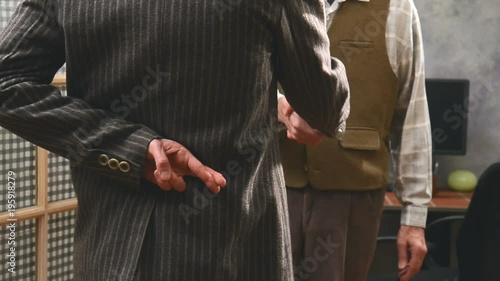shaking hands with crossed fingers