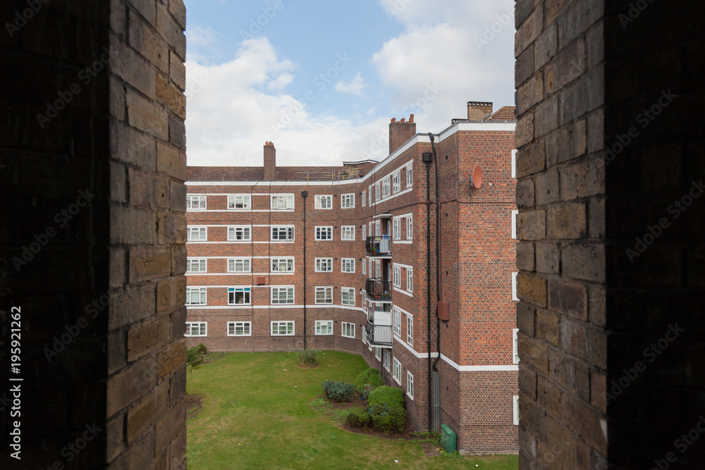 Red brick building with white windows in London, UK Red brick building with white windows in London, UK