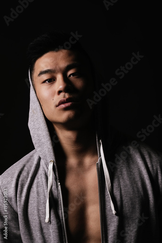 Portrait of young asian boy with sportswear.
