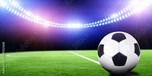 Soccer field at warm summer day and blue sky