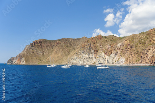 Yachts at the rocky coast of Lipari Island © mkos83