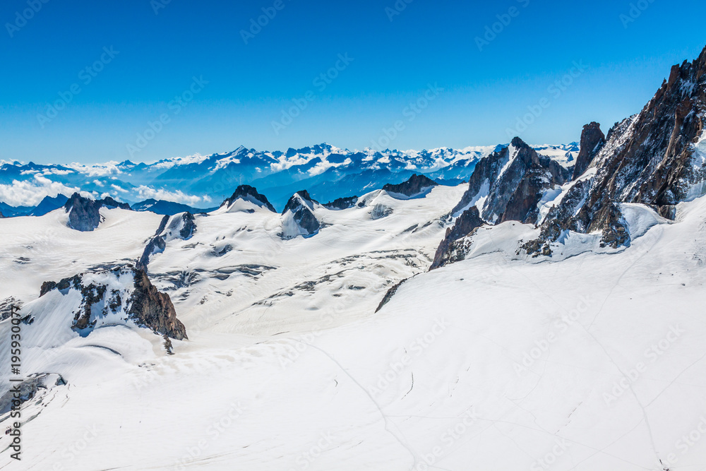 View of Mont Blanc mountain range from Aiguille Du Midi in Chamonix - landscape orientation