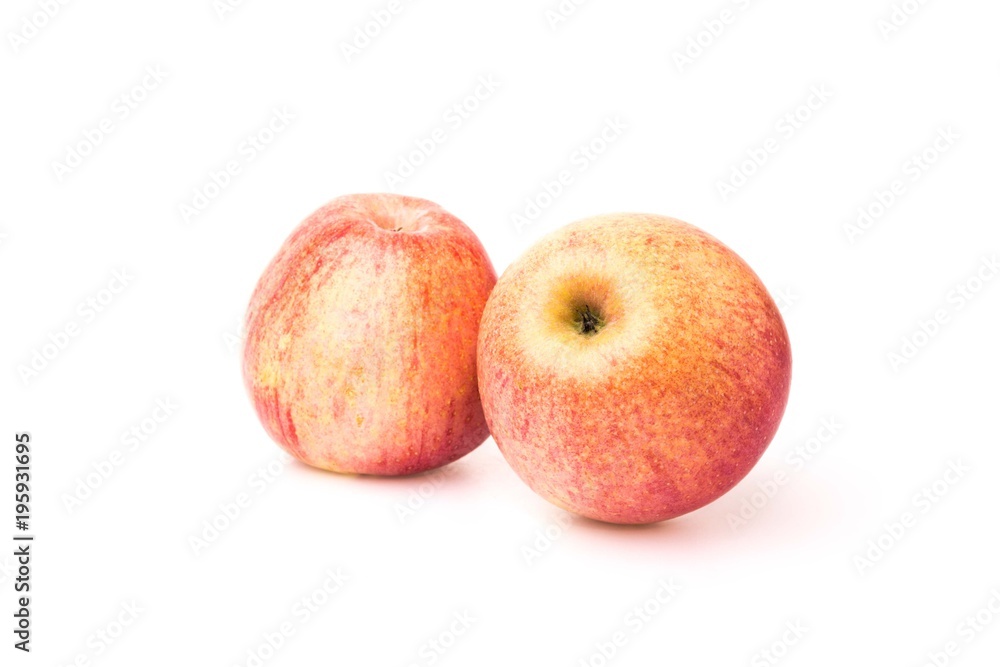 Fuji apples with drops of water on white background Fuji apples with drops of water on white background