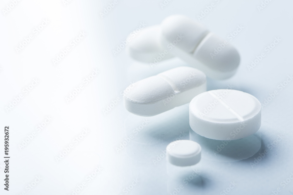 Pharmacy theme, white medicine tablets antibiotic pills. Pharmacy theme, white medicine tablets antibiotic pills.