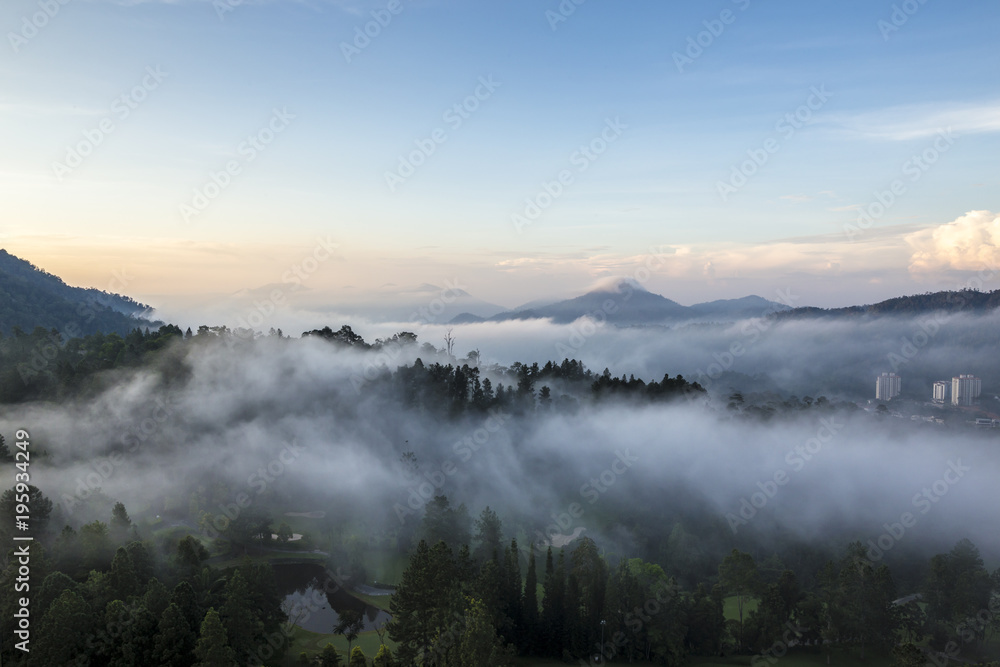 Clouds of misty mountain ranges as viewed from genting highlands Clouds of misty mountain ranges as viewed from genting highlands