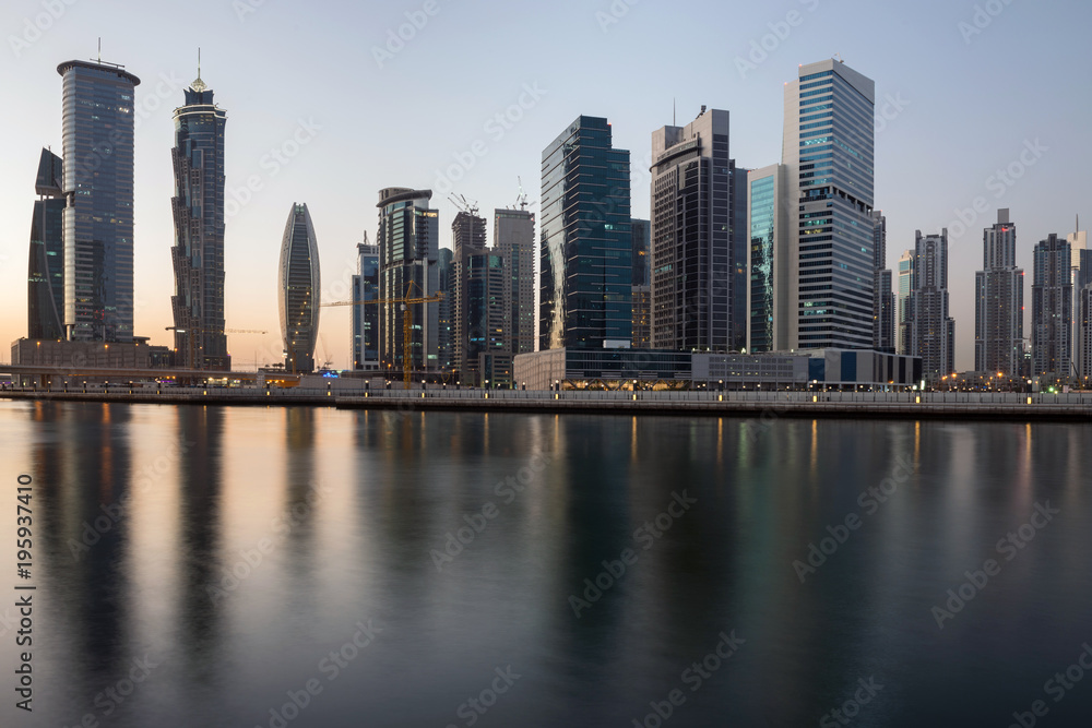 Skyline of Business bay of Dubai at dusk, UAE