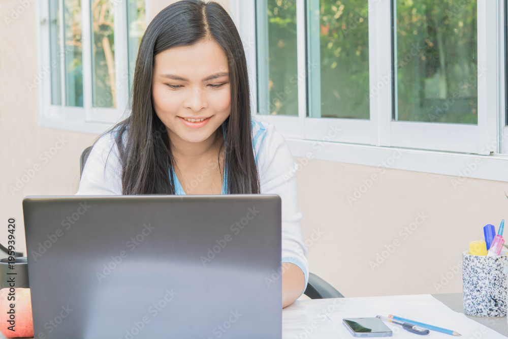Working women and laptop computer on the desk, Working women and laptop computer on the desk,