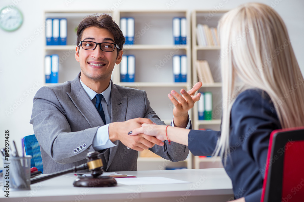 Lawyer discussing legal case with client Lawyer discussing legal case with client
