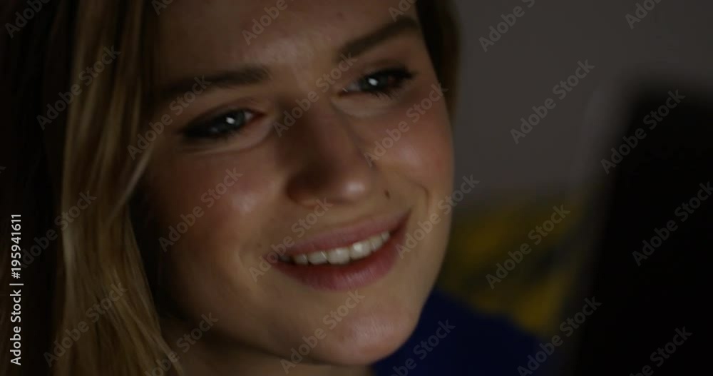 4K Close up cheerful but tired young woman working late on computer 4K Close up cheerful but tired young woman working late on computer