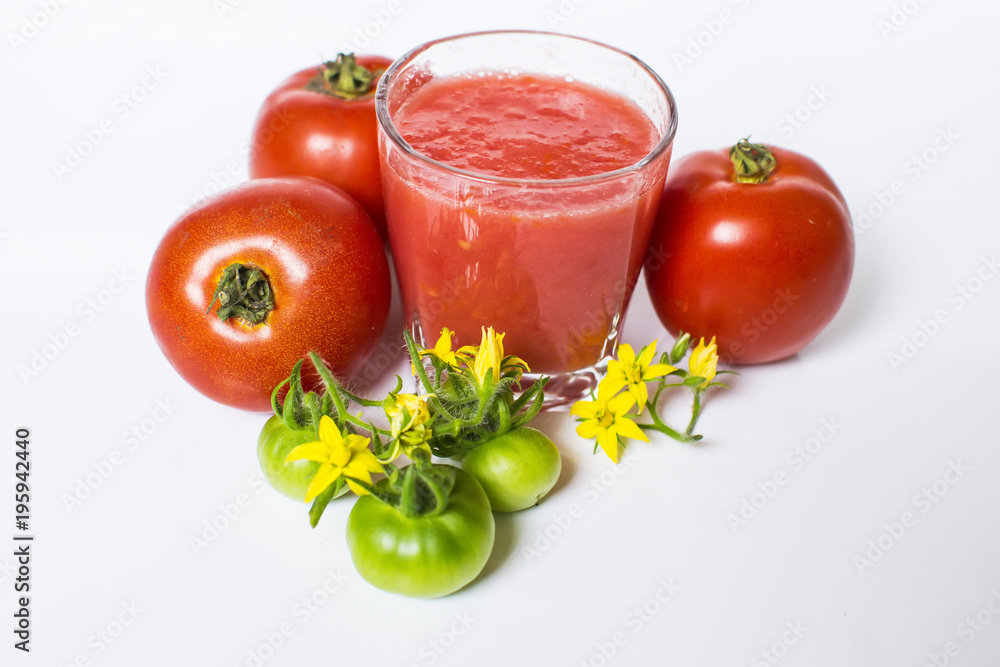 Fresh tomato juice isolated on white background