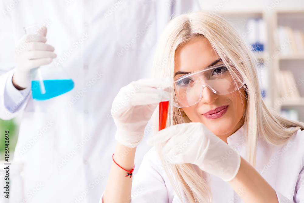 Young female woman doctor in hospital clinic lab Young female woman doctor in hospital clinic lab