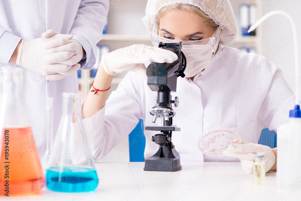 Young female woman doctor in hospital clinic lab Young female woman doctor in hospital clinic lab