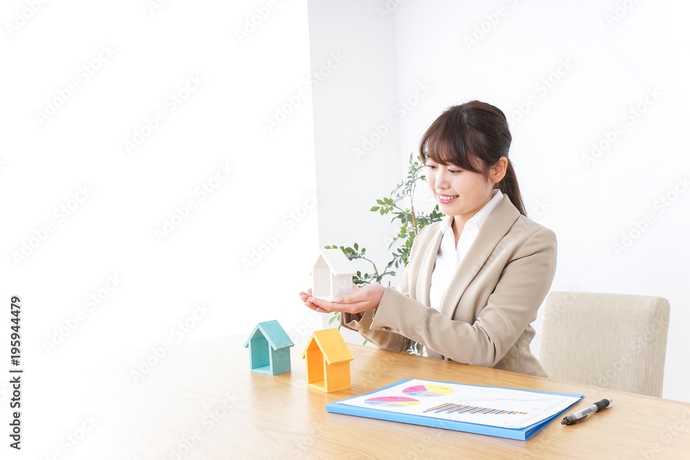 Businesswoman selling real estate Businesswoman selling real estate