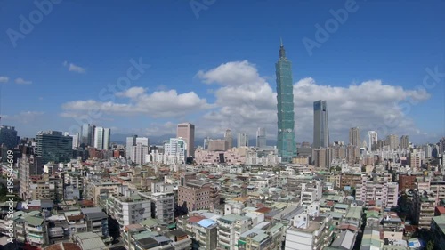 Aerial drone shot above the city of Taipei, Taiwan in a clear sky photo
