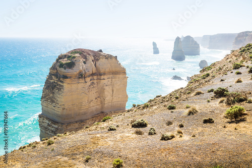 Behind the cliffs at Twelve Apostels overlooking the sea at the Great Ocean Road, Victoria, Australia photo