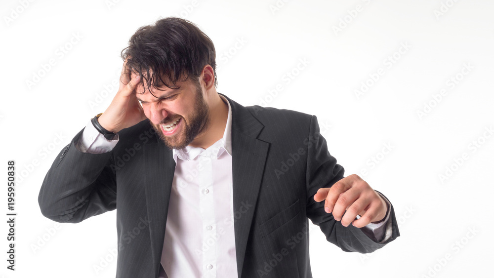 the businessman experiences a strong headache. He put one hand on his head. Close-up portrait. Isolated on white. the businessman experiences a strong headache. He put one hand on his head. Close-up portrait. Isolated on white.