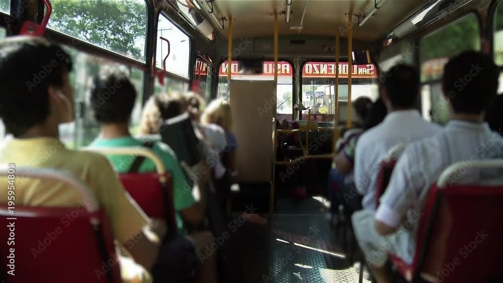 Blurred People Sitting inside a Public Bus in Asuncion, Paraguay, South America. Blurred People Sitting inside a Public Bus in Asuncion, Paraguay, South America.