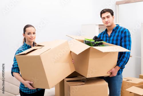 Young family relocating to new house apartment