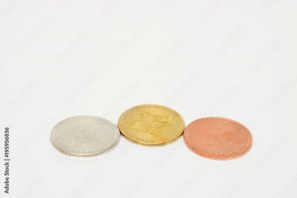 Cryptocurrency silver golden bronze bitcoin on white isolated background. Virtual digital money concept. Cryptocurrency silver golden bronze bitcoin on white isolated background. Virtual digital money concept.