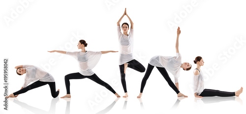 Set of young woman doing yoga in different positions photo