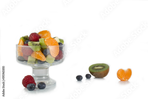 fruit salad raspeberries blueberries and kiwi photo