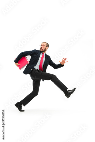 Businessman running with a folder on white background
