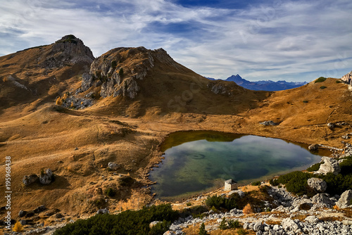 Small lake under Passo Valparola, Dolomites, Italy © janmiko