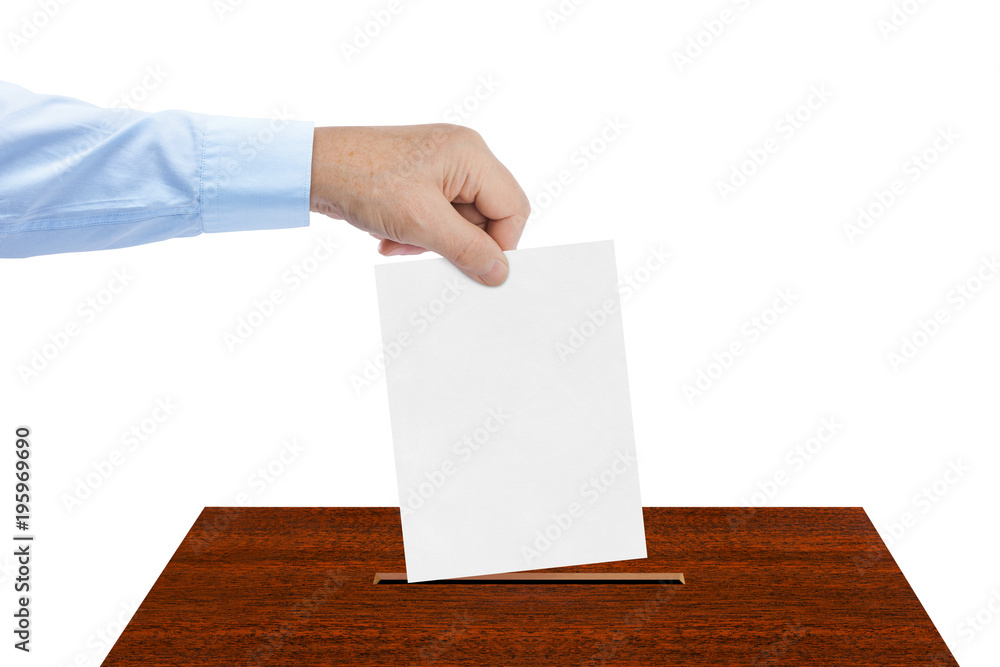 Hand with paper ballot Hand with paper ballot