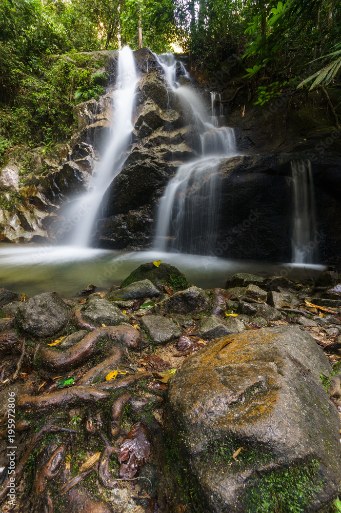 Obraz premium scenery of tropical forest waterfall
