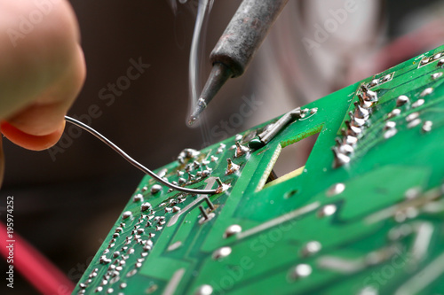 Фотография Repair of electronic devices, tin soldering parts