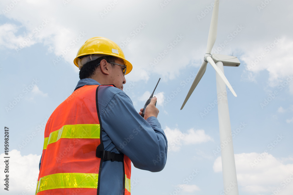 Male Architect or Engineer use Two way Radio Male Architect or Engineer use Two way Radio