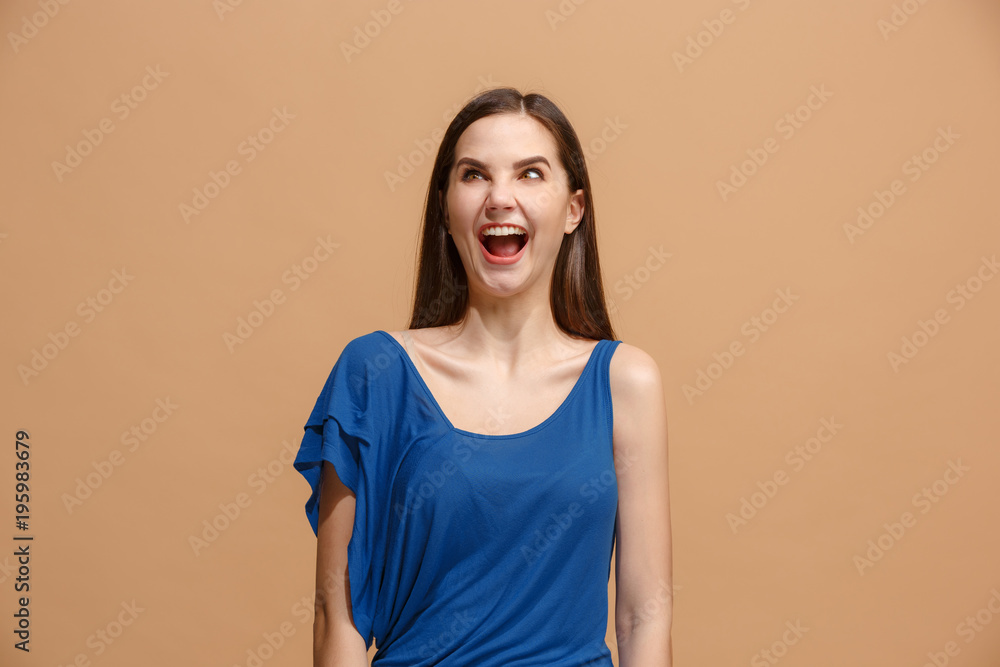 The woman with weird expression isolated on pastel The woman with weird expression isolated on pastel
