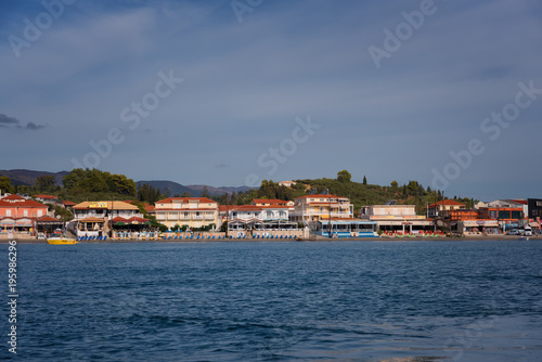 View from the sea to the beach of Agios Sostis, Zakynthos Island, Greece.Typical island architecture.