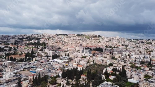Wallpaper Mural Aerial footage of Nazareth heading towards the Basilica of the Annunciation over the old city houses Torontodigital.ca