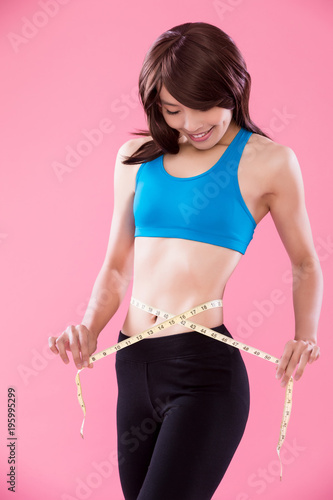 woman take waist scale © ryanking999