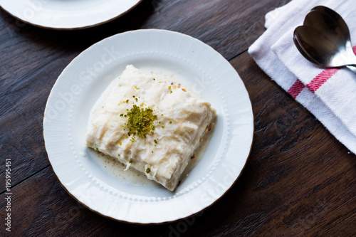 Turkish Milk Dessert Sutlava made with Gullac and Dairy Baklava Dough photo