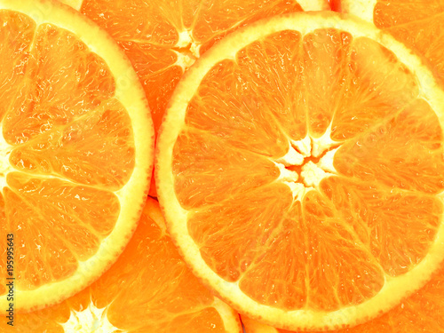 Fototapeta Naklejka Na Ścianę i Meble -  Slices of fresh orange texture background.