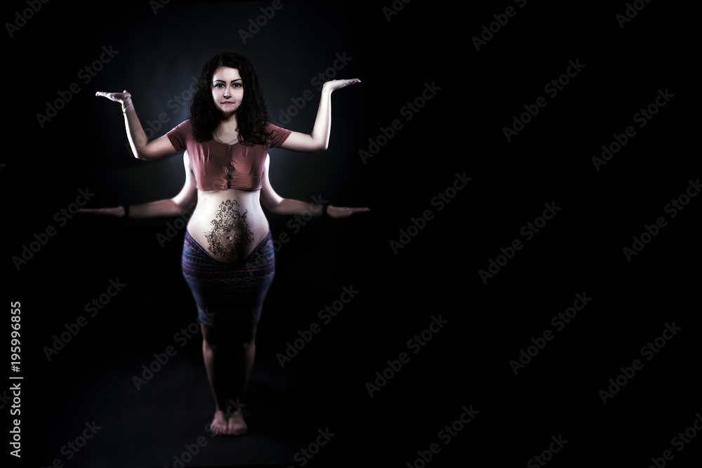 pregnant woman on a black background,depict the many-armed Hindu goddess, with space for text, the concept of everywhere successful girl
