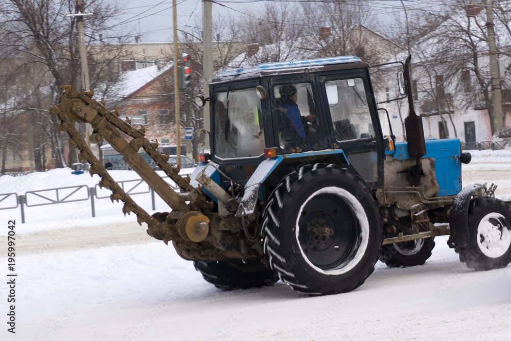 Old tractor with circular saw for cutting firewood. Old tractor with circular saw for cutting firewood.