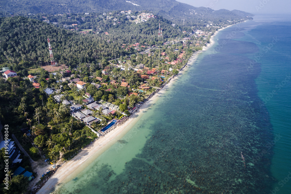 great aerial drone flight over beautiful beach and sea in thailand, koh samui