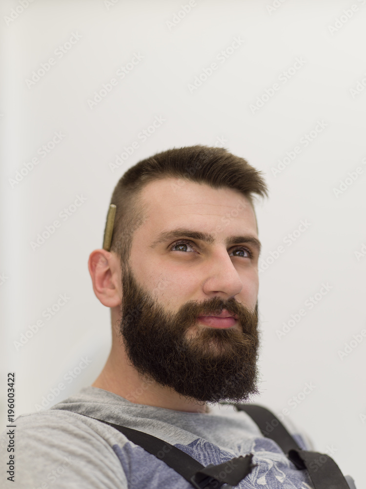 portrait of bearded hipster handyman portrait of bearded hipster handyman