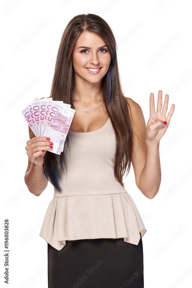 Woman with euro money paper currency in hand showing four fingers, over white background Woman with euro money paper currency in hand showing four fingers, over white background