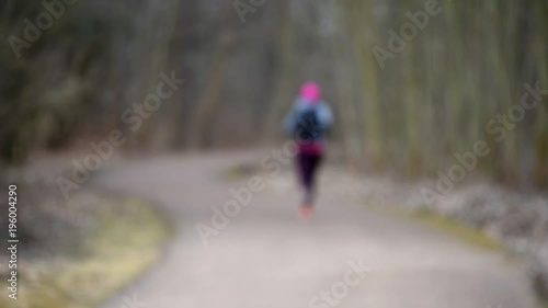 Wallpaper Mural Woman running on the road. Defocus
 Torontodigital.ca