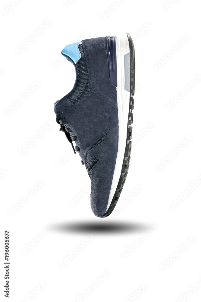 Blue running shoe isolated on white background. Blue running shoe isolated on white background.
