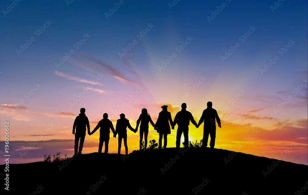 friends silhouette holding hand in hand friends silhouette holding hand in hand