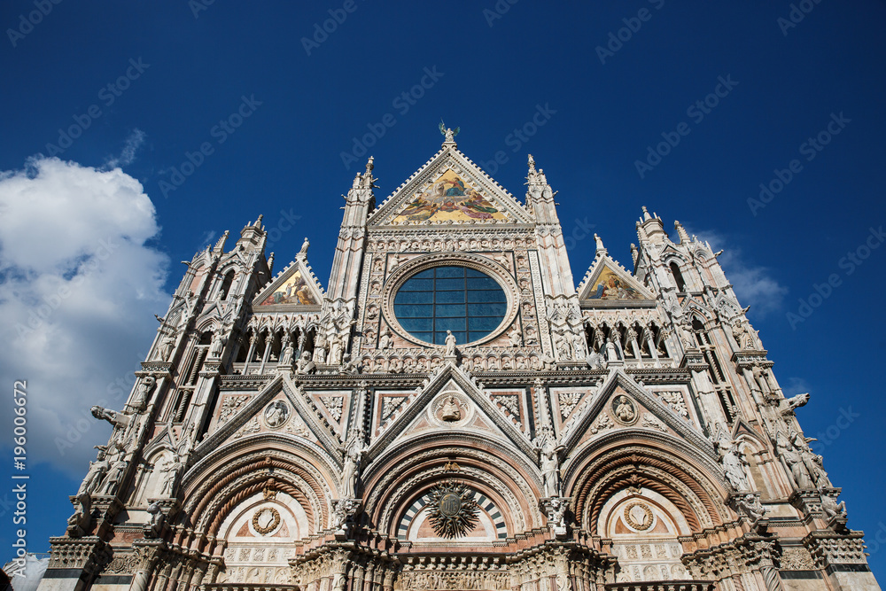 Breathtaking view of Siena Cathedral Santa Maria Assunta (Duomo) facade. Location Tuscany, Italy. Picturesque travel destination postcard.