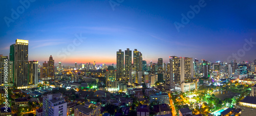 modern office buildings and condominium in Bangkok city downtown with sunset sky and clouds at Bangkok , Thailand.